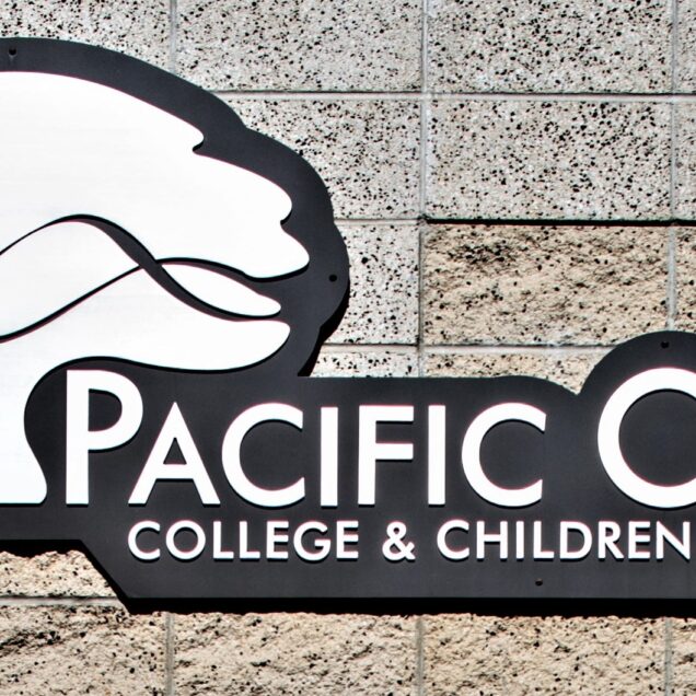 Close up of Pacific Oaks College sign on building